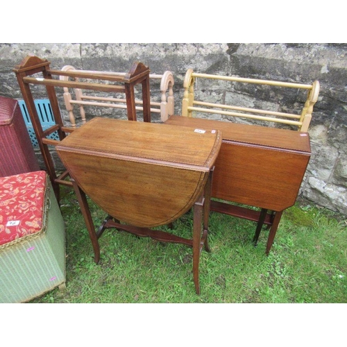 96 - A collection of furniture to include 4 towel rails, 2 Lloyd Loom style items, 2 tables etc