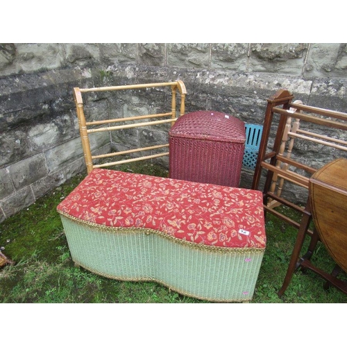 96 - A collection of furniture to include 4 towel rails, 2 Lloyd Loom style items, 2 tables etc