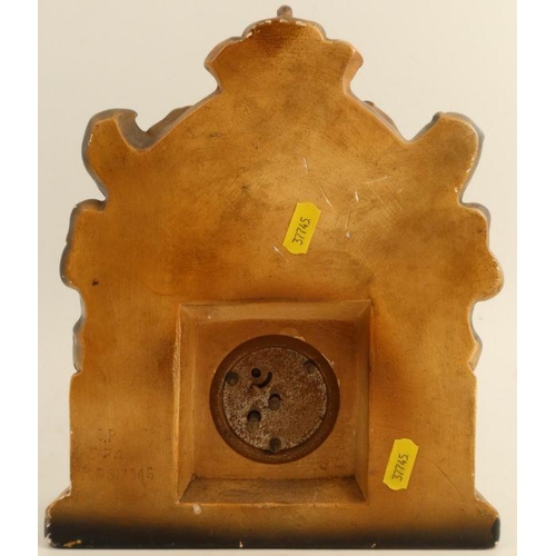 102 - A plaster Royal Commemorative mantel clock, with portraits, dated 1937, height 10.5ins