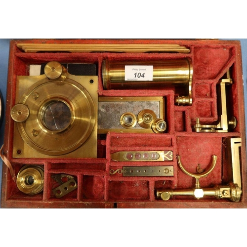 104 - A Georgian travelling field monocular lacquered brass microscope, of Benjamin Martin type, with acce... 