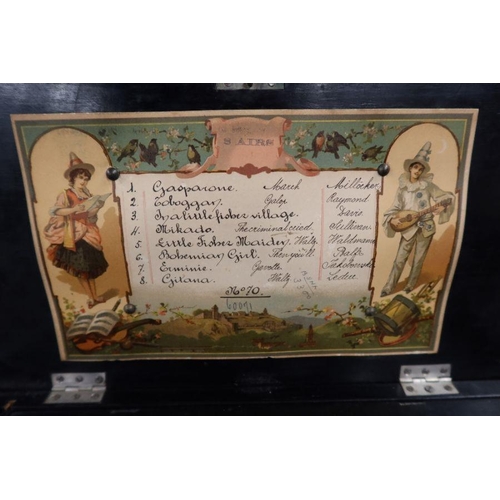 124 - A 19th century Swiss table top cylinder music box, playing 8 airs, with paper label to interior of t... 