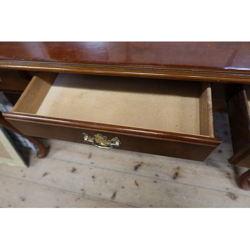 13 - A side table, fitted two drawers, raised on cabriole legs, width 48ins, depth 24ins