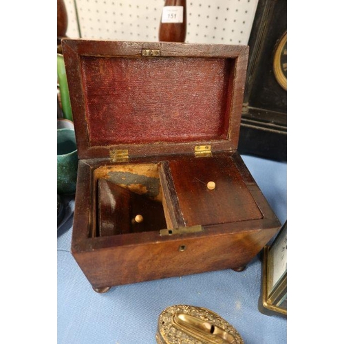 148 - A 19th century mahogany sarcophagus shaped tea caddy, together with a carriage clock and a lighter