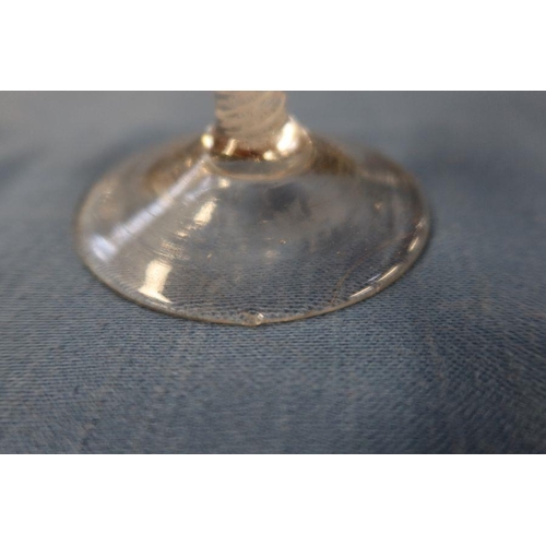 203 - An Antique cordial glass, with air twist stem and vine decoration to the bowl