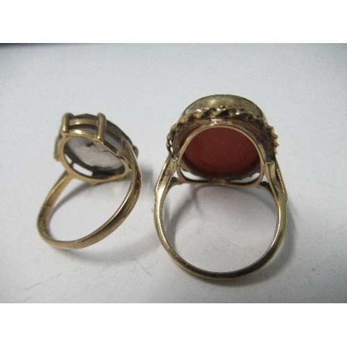 229 - A 9 carat gold Sardonyx ring, together with a 9 carat gold smoky quartz ring, 9.2g gross