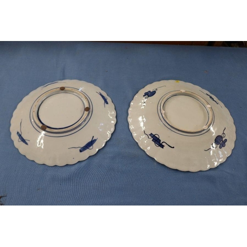 239 - Two Imari pattern wall plates