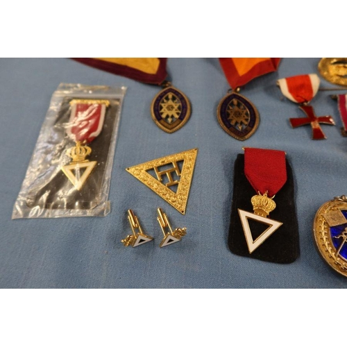 246 - A collection of Masonic medals, in silver, silver gilt and metal, together with a pair of cufflinks