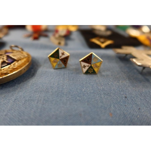 246 - A collection of Masonic medals, in silver, silver gilt and metal, together with a pair of cufflinks