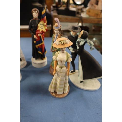 264 - A collection of porcelain figures, some Albany Fine China