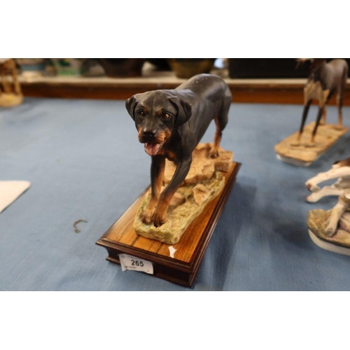 265 - Albany Fine China, four porcelain models of dogs and one of a cat