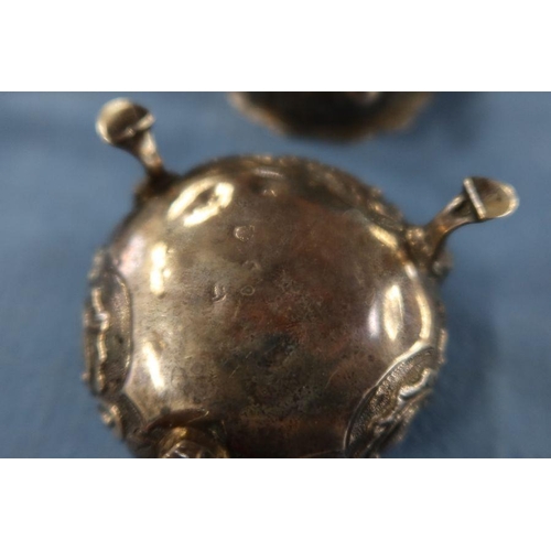 290 - A collection of hallmarked silver condiments, to include a cased pair of pepper pots, two covered mu... 