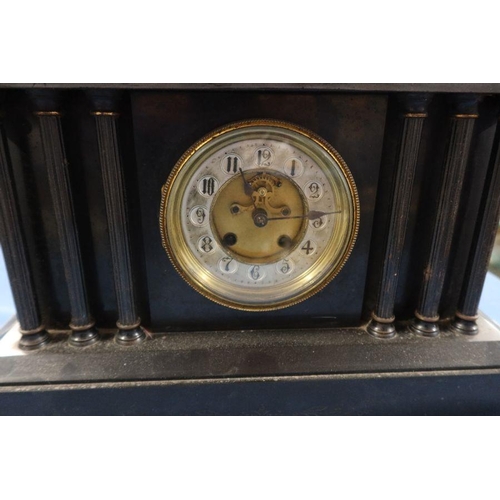 294 - A Victorian black slate mantel clock, of architectural form