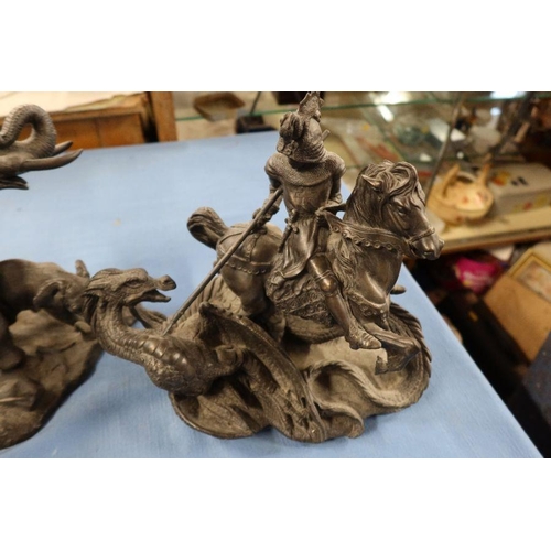 302 - Two bronzed resin models, Elephants and George and the Dragon