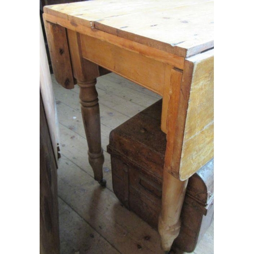 31 - A pine pembroke table, width 46ins, height 30ins