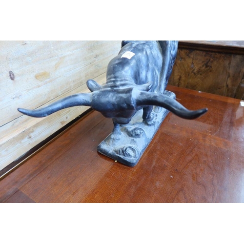 331 - An Austin Prod Inc model, figure riding a water buffalo, height 19.5ins