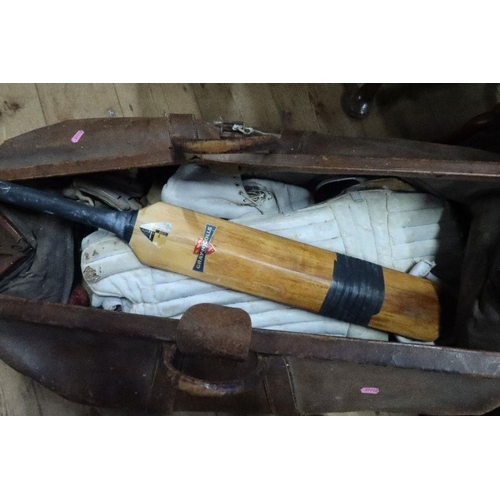 368 - A vintage cricket bag, together with pads, bat etc 