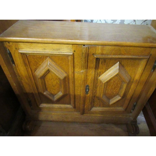 51 - An oak set of shelves, with carved decoration, width 25ins, height 66ins