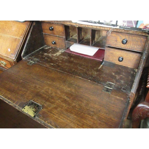 54 - An oak bureau, width 31ins