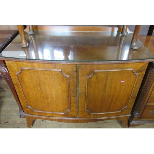 57 - A mahogany bow fronted cabinet, width 39ins, height 29ins