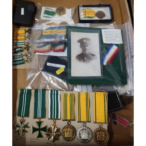 A collection of medals, to include medals presented to Cpl D W G Jones ...