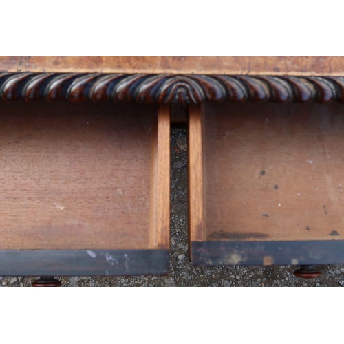 100 - A 19th century birds eye maple center table, of rectangular form, fitted with two real frieze drawer... 