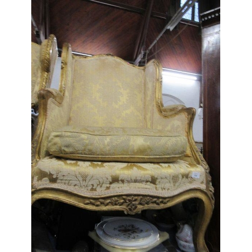 124 - Three continental style gilt frame armchairs, to include two wingback examples and an open arm examp... 