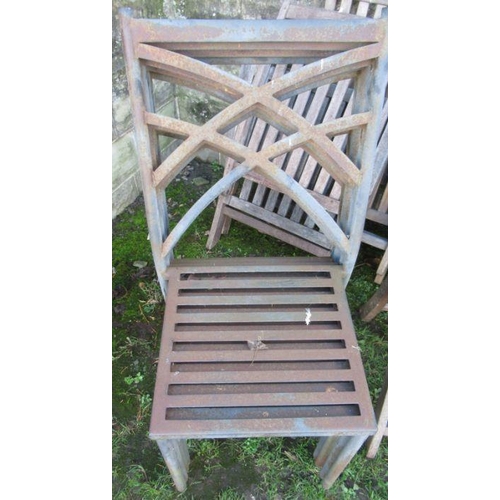 125 - A collection of garden furniture to include stacking metal chairs, 11 folding danish design chairs, ... 