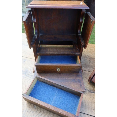 150 - An Edwardian mahogany and satinwood inlaid coal box, with sloping fall flap, together with an oak bo... 