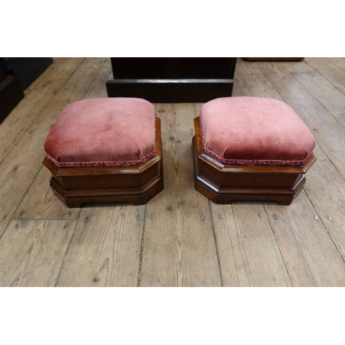 155 - A pair of mid Victorian octagonal mahogany upholstered footstools on block feet with lift-up lid enc... 