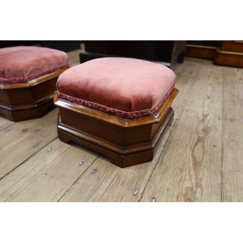 155 - A pair of mid Victorian octagonal mahogany upholstered footstools on block feet with lift-up lid enc... 