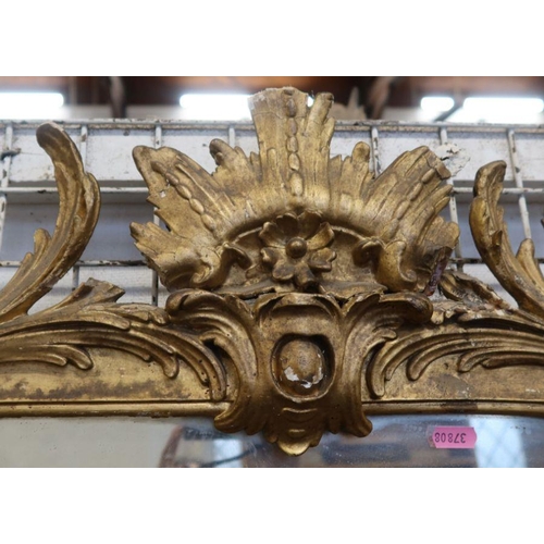 156 - A 19th century gilt framed wall mirror, the frame decorated with flowers and scrolls, overall size 5... 