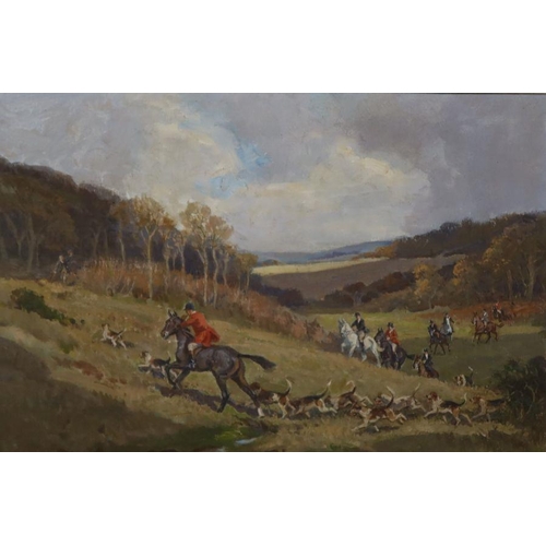 219 - R H Buxton, oil on canvas, hunting scene with hounds, 15.5ins x 23.5ins