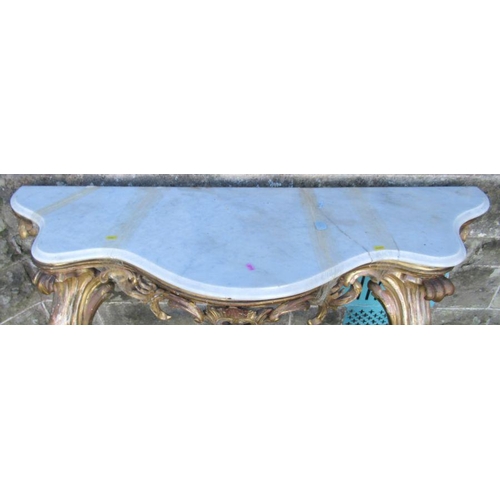 22 - A marble topped consol table, with ornate gilt base, marble af, width 56ins, height 35ins