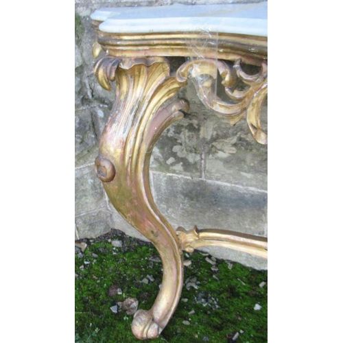 22 - A marble topped consol table, with ornate gilt base, marble af, width 56ins, height 35ins