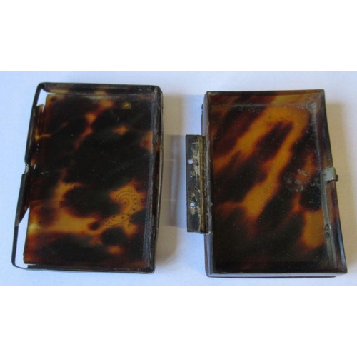 242 - A Georgian tortoiseshell snuff box, with scroll decoration to the top and white metal mounts, 3ins x... 