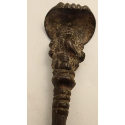 245 - A 19th century Himalyan Buddhist ritual spoon, with Ganesh finial, length 5.5ins