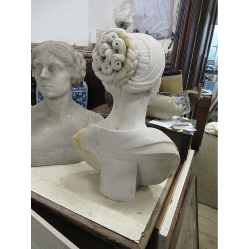 257 - An Antique marble bust, of a woman with a plaited bun in her hair, height 19ins