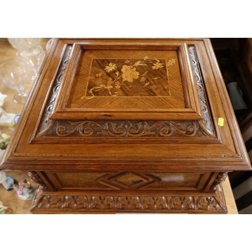 260 - A 19th century walnut and mahogany cased table top polyphon, with inlaid and carved decoration, toge... 