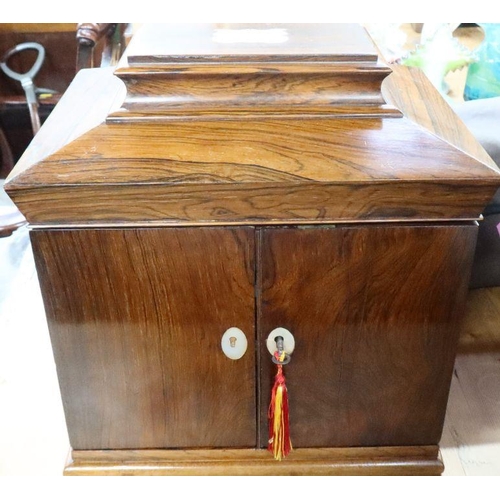 261 - A 19th century rosewood table top cabinet, with inlaid mother of pearl decoration, the hinged top op... 