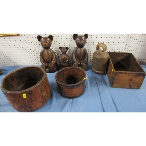 264 - A collection of wooden items, to include carved bears, bowls, a box, together with a metal cows bell