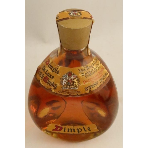 284 - A bottle of John Haig & Co Ltd Dimple De Luxe Scotch Whisky