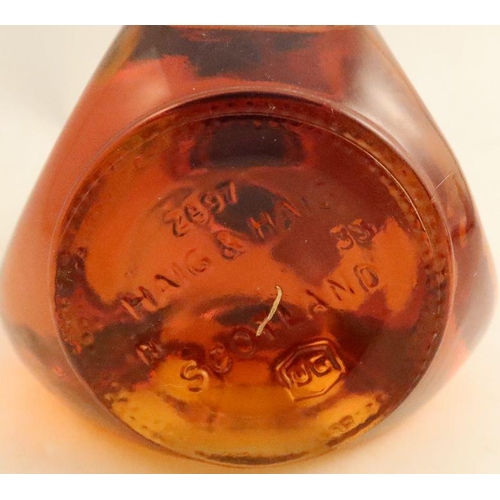 284 - A bottle of John Haig & Co Ltd Dimple De Luxe Scotch Whisky