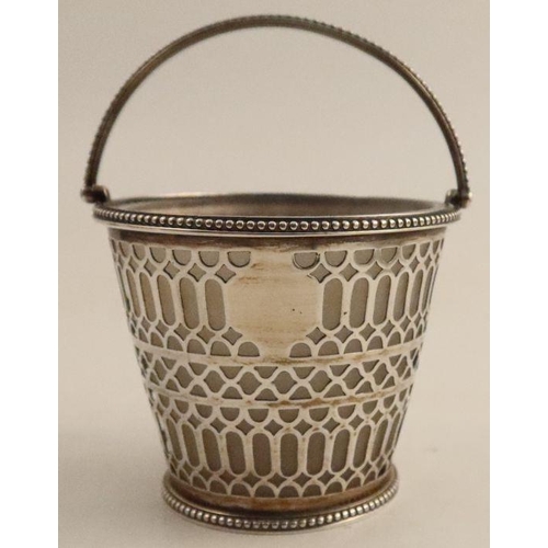 354 - A pierced silver pot, with frosted glass liner and swing handle, London 1816, height including handl... 