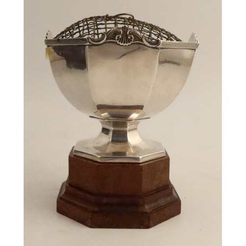 359 - A hallmarked silver rose bowl, Birmingham 1911, weight 9.5oz, diameter 5.5ins with wooden stand