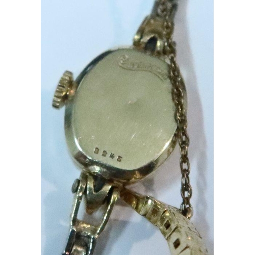 363 - A 14k Lucien Picard wrist watch, the octagonal dial having baton numerals, on 14k bracelet with diam... 