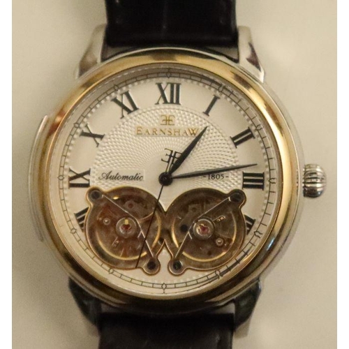 369 - Earnshaw, an automatic wrist watch, with visible balance wheels, stainless steel case