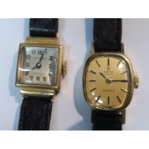 375 - An 18k gold case lady's wrist watch, on leather strap, together with a 9k gold cased lady's watch, o... 