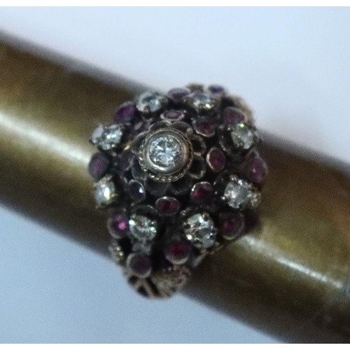 391 - A gold ring set with three blue stones, together with an antique style ruby and diamond ring