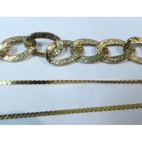 397 - A 14k Italian oval link necklace, together with a 14k flat link necklace, total weight 15.0g