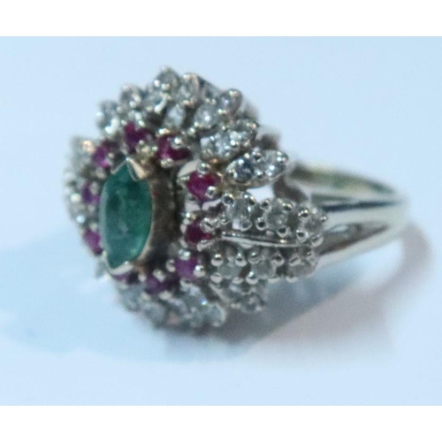 400 - A 14k emerald, ruby and white stone ring, (possibly white sapphire), weight 9g